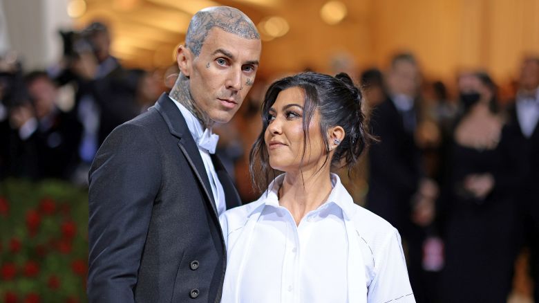 (L-R) Travis Barker and Kourtney Kardashian attend The 2022 Met Gala Celebrating "In America: An Anthology of Fashion" at The Metropolitan Museum of Art on May 02, 2022 in New York City.